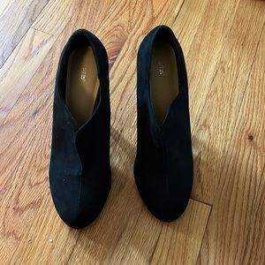 Black suede pumps